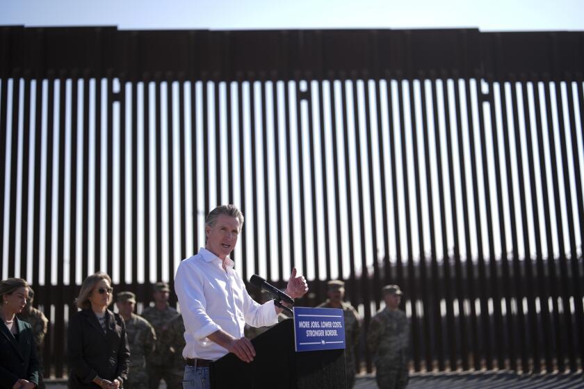 California Gov. Gavin Newsom speaks during a news conference near the Otay Mesa Port of Entry along the border with Mexico, Thursday, Dec. 5, 2024, in San Diego. (AP Photo/Gregory Bull)