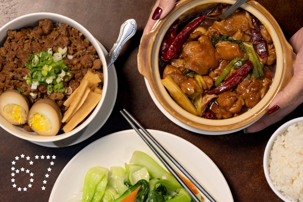 LOS ANGELES, CA - OCTOBER 29, 2024: A spread of popular dishes at Pine & Crane in downtown Los Angeles including: Minced Pork on Rice, Three Cup Chicken with rice, and Sauteed Seasonal Vegetables (Ron De Angelis / For The Times)