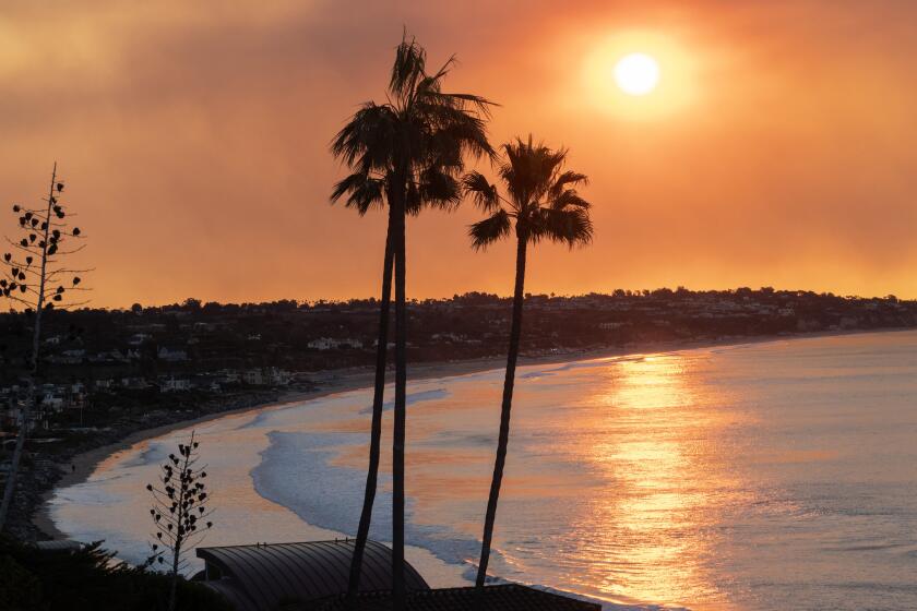 MALIBU, CA - DECEMBER 10: Smoke from the Franklin fire creates a colorful sunrise in Malibu, CA on Tuesday, Dec. 10, 2024. (Myung J. Chun / Los Angeles Times)