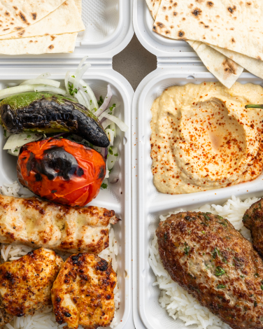 GLENDALE, CA - SEPTEMBER 25: Combo plate with chicken lule, pork tenderloin, chicken thigh shish kabob, left, and beef cutlet plate at Mini Kabob in Glendale, CA on Wednesday, Sept. 25, 2024. (Myung J. Chun / Los Angeles Times)