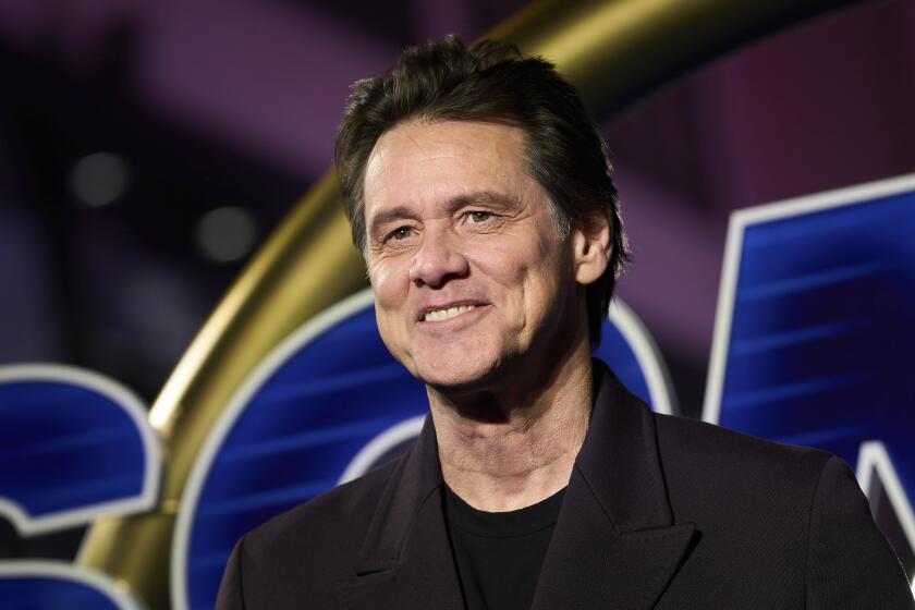 Jim Carrey smiles in a black jacket at the premiere of 'Sonic the Hedgehog 3' in London, on Dec. 10, 2024. 