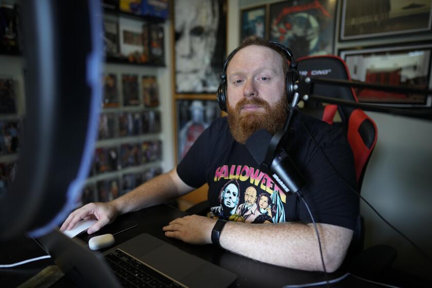 Greenwood, IN - September 21: Brent Terhune poses for a portrait in his home podcasting studio Thursday, Sept. 21, 2023 in Greenwood, IN. (Photo by AJ Mast/For the LA Times)