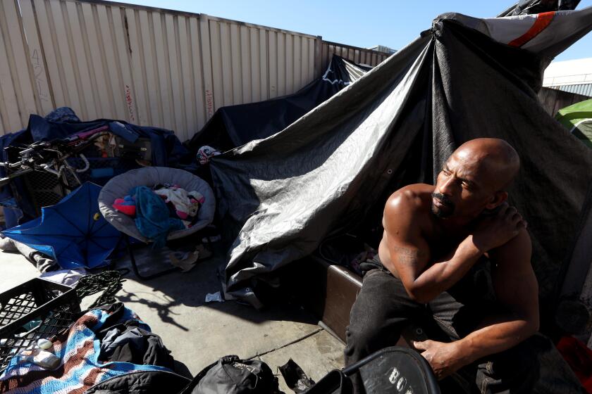 LOS ANGELES, CA - NOVEMBER 20, 2024 - - "We're not criminals," said Keith Aaron Robinson, 44, responding to President-elect Trumps promise regarding the homeless, and has been living in Skid Row for over 5 years in downtown Los Angeles on November 20, 2024. President-elect Donald Trump has promised to arrest thousands of homeless people sleeping in American streets and move them to large tent cities on "inexpensive land," one of several planks of his agenda that would upend a national strategy that focuses on finding people housing on a voluntary basis. (Genaro Molina/Los Angeles Times)