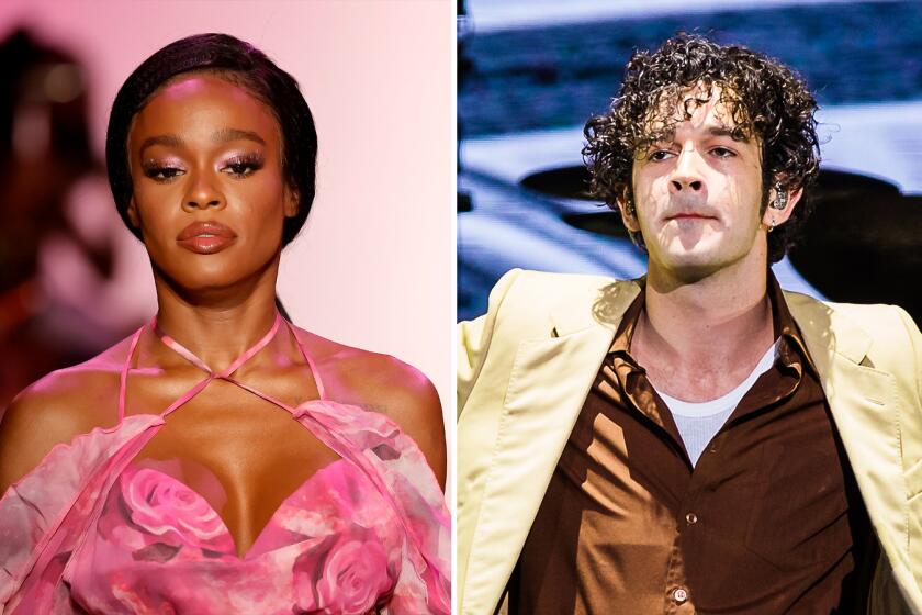 Azealia Banks, left, in a pink dress  and Matthew Healy in a yellow jacket and brown shirt (Getty Images)